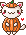 small white cat standing on hind legs in an orange pumpkin costume.