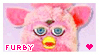 stamp with picture of a pink furby that simply says furby.